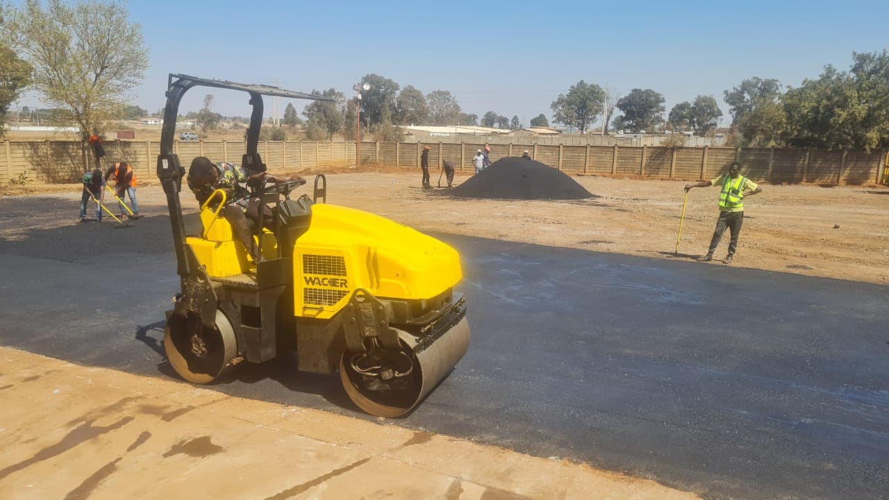 Newly laid tar surface by Nkosiigt